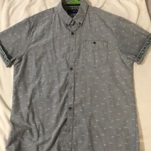 Light gray button down short sleeve shirt